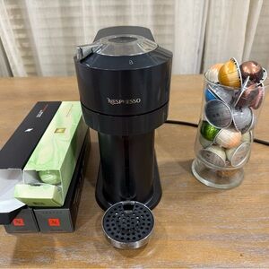 Nespresso Black Coffee Machine with Silver Accents